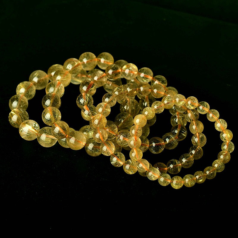 Natural gold hairclast bracelet men and women Huangfeng crystal gold silk gold titanium crystal transport hand series