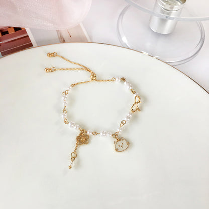 Japanese soft cute girl kitten hand chain beautiful cute pearl butterfly hand ring flower hand decoration 3399Y5