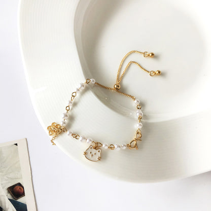 Japanese soft cute girl kitten hand chain beautiful cute pearl butterfly hand ring flower hand decoration 3399Y5